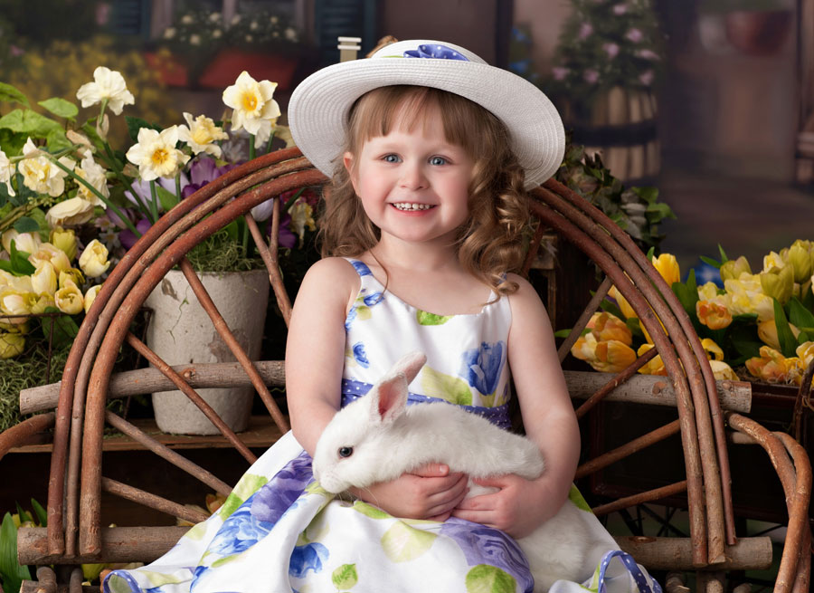 girl with bunny in garden setting